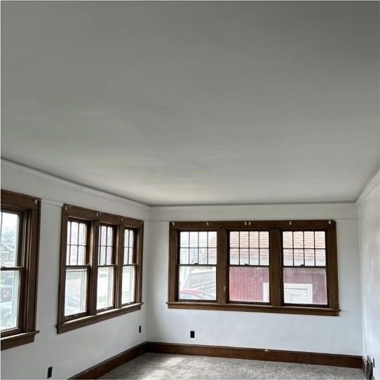 Smooth new ceiling in a remodeled living room