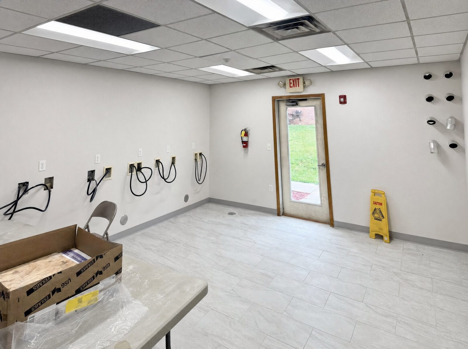 Commercial office with new drywall and drop ceiling